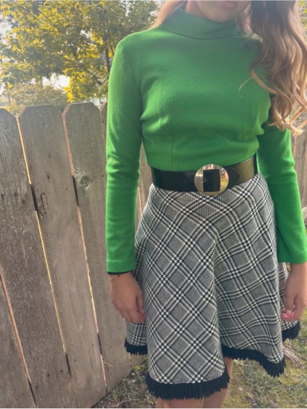 Vintage Mod Green Knit Top with Black-and-White Plaid Fringe Midi Skirt